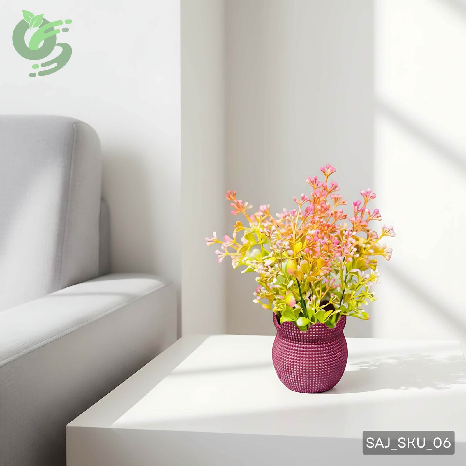 বেগুনি টবসহ হালকা গোলাপি ও কমলা রঙের কৃত্রিম ঝাউ ফুল গাছ